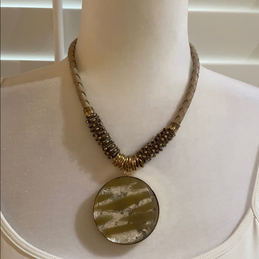 A taupe, silver and gold necklace!